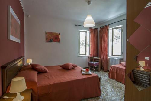 Кровать или кровати в номере Le Margherite Country House