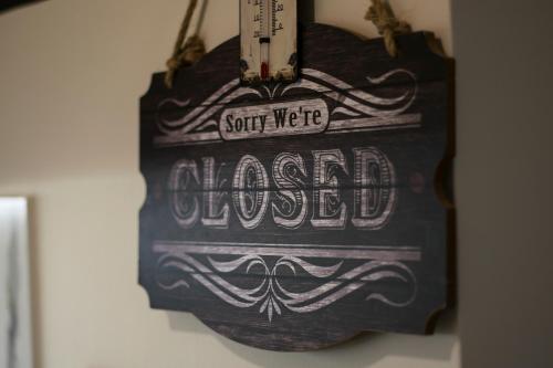 a chalkboard sign with a beard on a wall at Traditional house of 1898 in the heart of old town of Nafplio in Nafplio