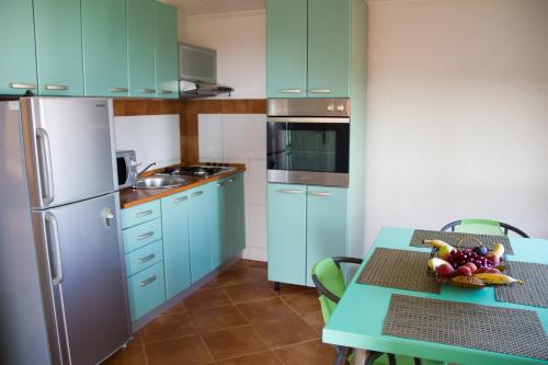 Η κουζίνα ή μικρή κουζίνα στο Apartments Lux seaview