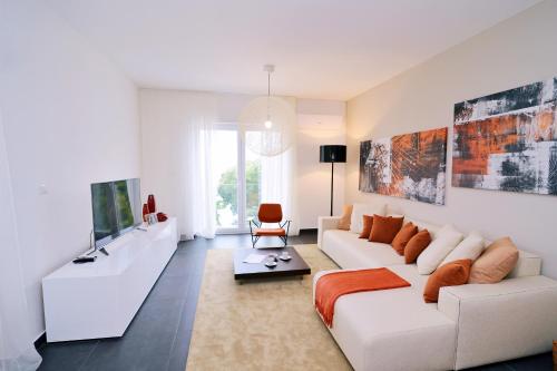 TV a/nebo společenská místnost v ubytování Plage Lovran Residence