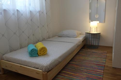 Posteľ alebo postele v izbe v ubytovaní Apartment Pixel