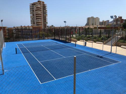a tennis court on top of a building at Sunset Drive Vistas Magicas in Benidorm
