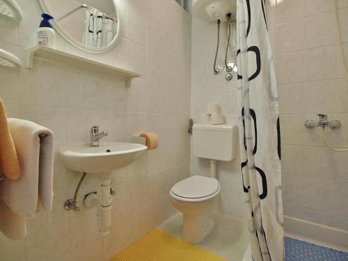 Koupelna v ubytování Dada Apartments