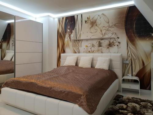 Postel nebo postele na pokoji v ubytování Apartmán Ambrosia