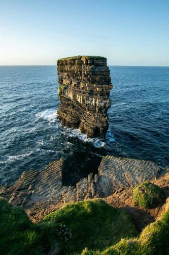 a rock pillar in the ocean next to the ocean at THISTLEDOWN - Ballina - Crossmolina - County Mayo - Sleeps 8 - Sister property to Inglewood in Ballina