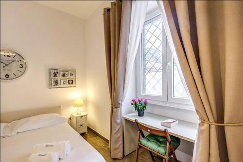 Posteľ alebo postele v izbe v ubytovaní Cuore di Florio Apartment