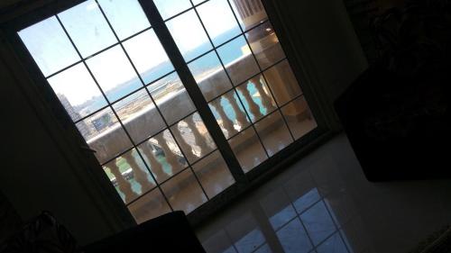 a view of a large window in a room at Stanley Bridge Apartment in Alexandria