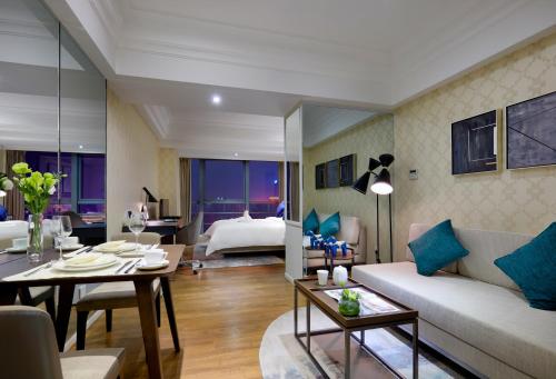 Una cama o camas en una habitación de Modena by Fraser Changsha