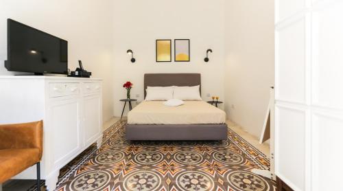 Cama o camas de una habitación en House of Pomegranates by Holi