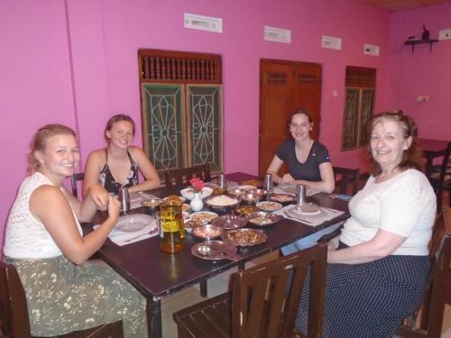 a group of women sitting around a table at El Shaddai in Mannar