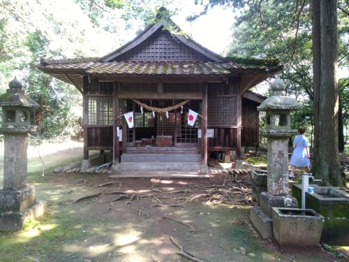 a small building with flags in front of it at Hitoyoshi Morinohall Ladies in - Female Only in Hitoyoshi