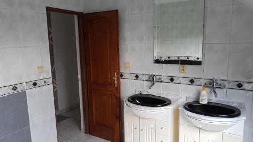 a bathroom with a toilet and a sink and a mirror at Homestay Kuchařovice in Kuchařovice