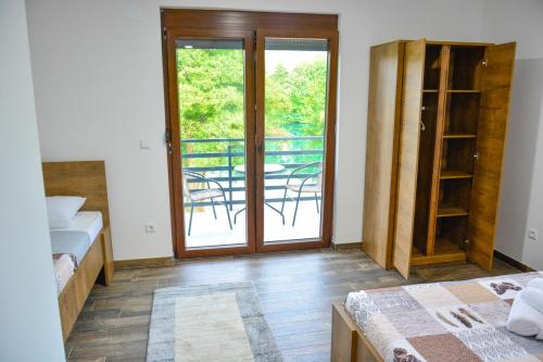 Ένα ή περισσότερα κρεβάτια σε δωμάτιο στο Villa Sabina