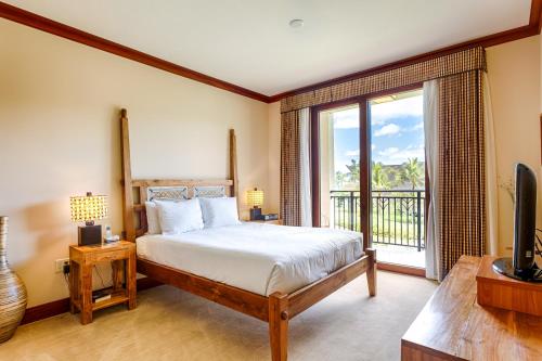 a bedroom with a bed and a large window at Third Floor villa Ocean View - Beach Tower at Ko Olina Beach Villas Resort in Kapolei
