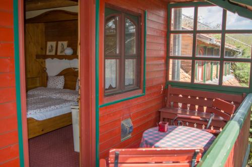 Postel nebo postele na pokoji v ubytování Garten Vendégház
