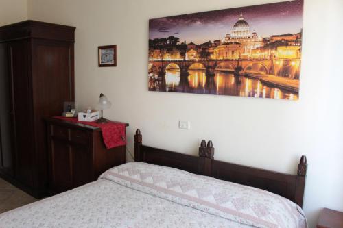 Postel nebo postele na pokoji v ubytování Ianus Guest House