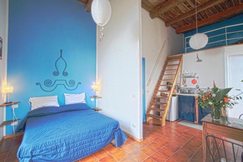Ein Bett oder Betten in einem Zimmer der Unterkunft La Casa sul Blu Albergo Diffuso