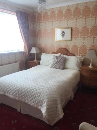 Postel nebo postele na pokoji v ubytování San Michele Guest House