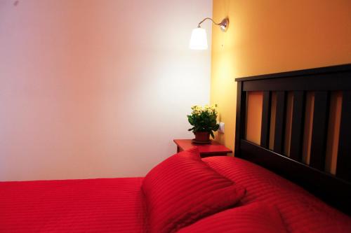 Ένα ή περισσότερα κρεβάτια σε δωμάτιο στο B&B Lavanda e Rosmarino