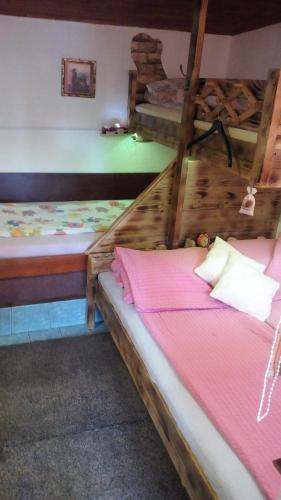 two bunk beds sitting in a room with at Holiday Home Nature Neno in Visoko