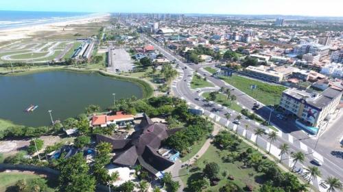 an aerial view of a city and the beach at Real Praia Hotel in Aracaju