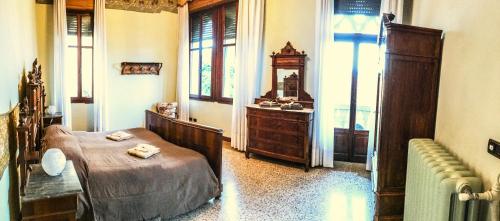 Säng eller sängar i ett rum på Villa Corrado