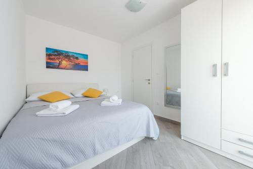 Postel nebo postele na pokoji v ubytování Guesthouse Pezo
