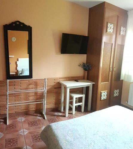 Ένα ή περισσότερα κρεβάτια σε δωμάτιο στο Hosteria Las Viñas
