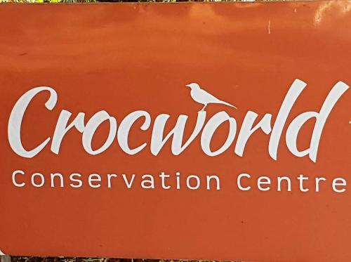 a sign for a convention center with a bird on it at Sole's Leap in Scottburgh