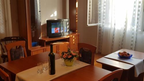 En tv och/eller ett underhållningssystem på City Apartment Ana 2