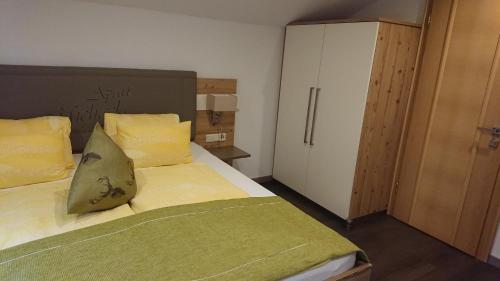 Ein Bett oder Betten in einem Zimmer der Unterkunft Apart Michaela