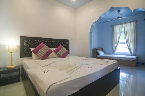 Lova arba lovos apgyvendinimo įstaigoje Azoush Tourist Guesthouse