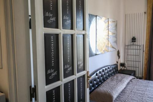 Letto o letti in una camera di Metropolitan b&b