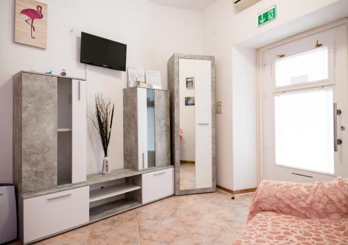 Postel nebo postele na pokoji v ubytování Studio apartman Mima