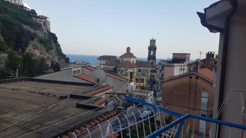 a view of a city from a balcony at La dea bendata in Minori
