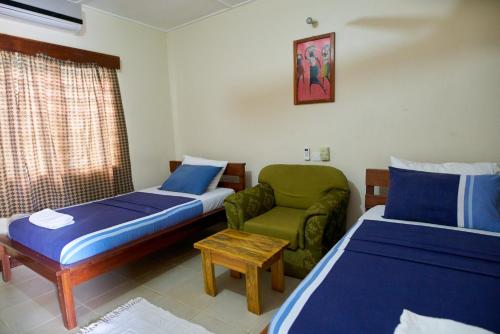 Katil atau katil-katil dalam bilik di Wli Water Heights Hotel
