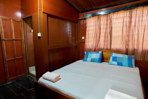 Ένα ή περισσότερα κρεβάτια σε δωμάτιο στο Wli Water Heights Hotel