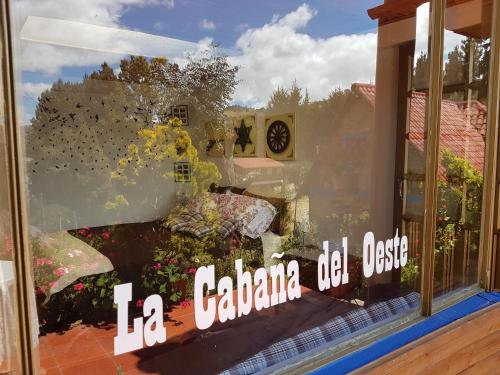 a display window of a gardenlife doll house at Cabañas Yukatan Lago de Tota in Tota