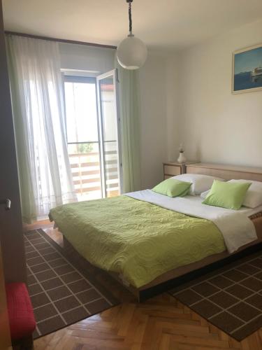 Posteľ alebo postele v izbe v ubytovaní House For Holidays Kozul