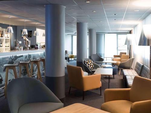 Coin salon dans l'établissement Novotel Château de Versailles