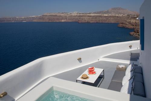 a view from the balcony of a boat in the ocean at Akrotiri Cove in Akrotiri
