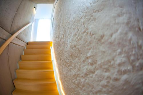 a staircase in a building with a stair case at Zeitraumferien in Bernau am Chiemsee