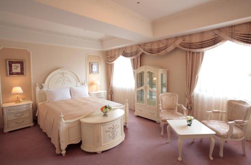 Katil atau katil-katil dalam bilik di Hotel Lake View Mito