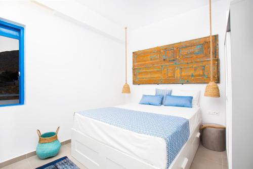 Lindos Portes Suites - Adults Onlyにあるベッド