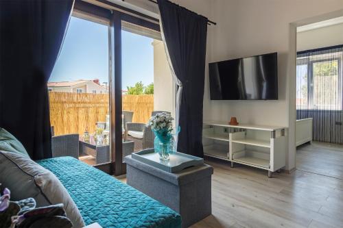 TV a/nebo společenská místnost v ubytování Apartment Danijela I