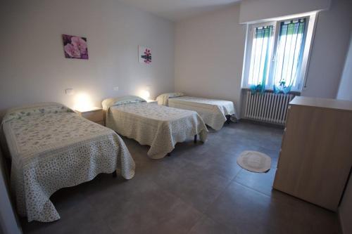 A bed or beds in a room at Casa Lorenzo