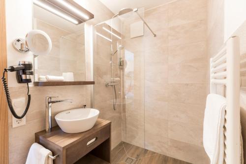 Ένα μπάνιο στο Hotel Alpenland