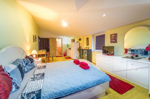 Ένα ή περισσότερα κρεβάτια σε δωμάτιο στο Apartments Magnolija