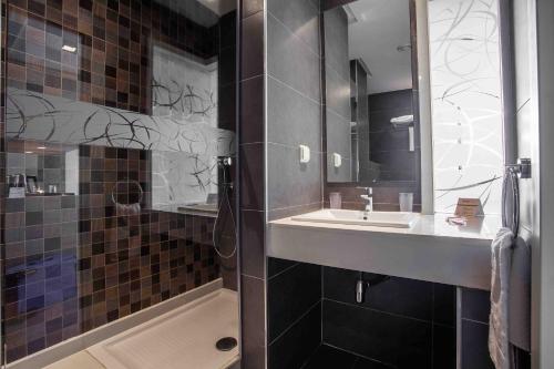 Vonios kambarys apgyvendinimo įstaigoje Relax Hotel Casa Voyageurs