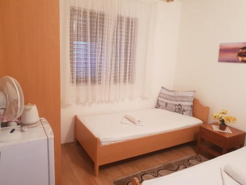 Postel nebo postele na pokoji v ubytování Guest House Alisa